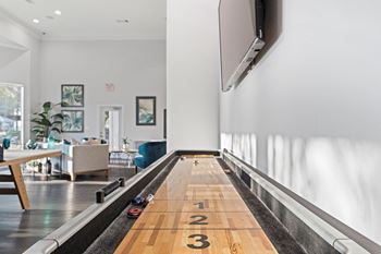 Shuffleboard in game room